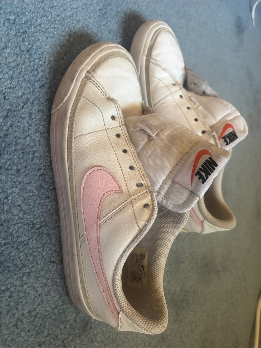 Nike White Low-Top Sneakers with Pink Swoosh